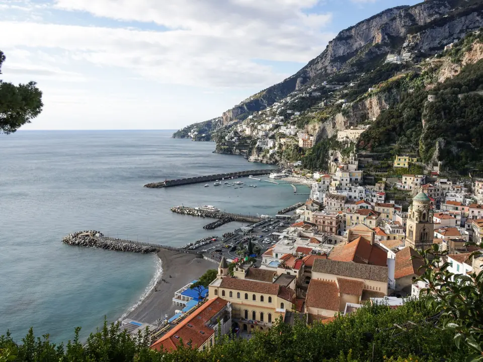 Breathtaking view of Amalfi's charming coastline with colorful buildings and Mediterranean Sea