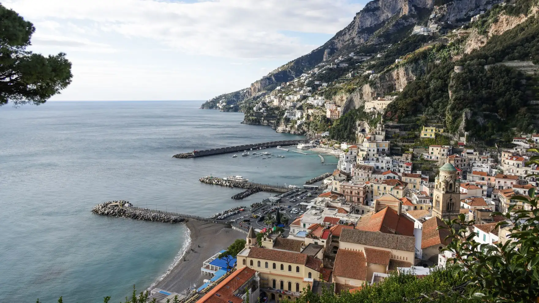 Breathtaking view of Amalfi's charming coastline with colorful buildings and Mediterranean Sea