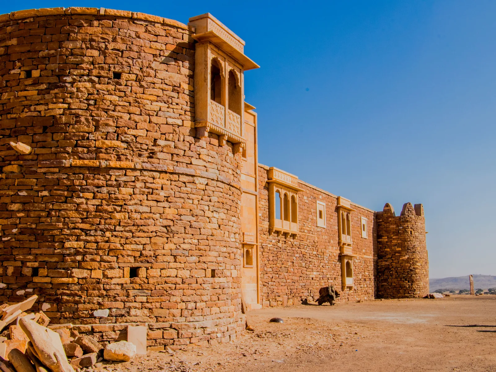 Capture of the ancient Khaba Fort amidst the arid landscapes of Jaisalmer, India