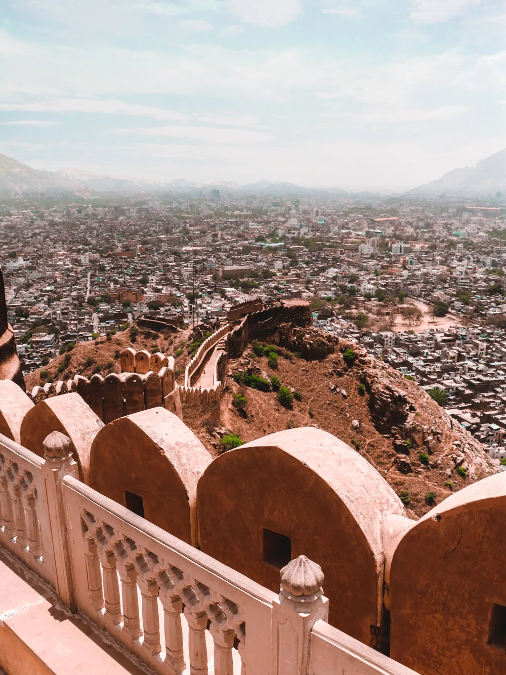 Jaipur's skyline spread beneath the ramparts of Nahargarh Fort