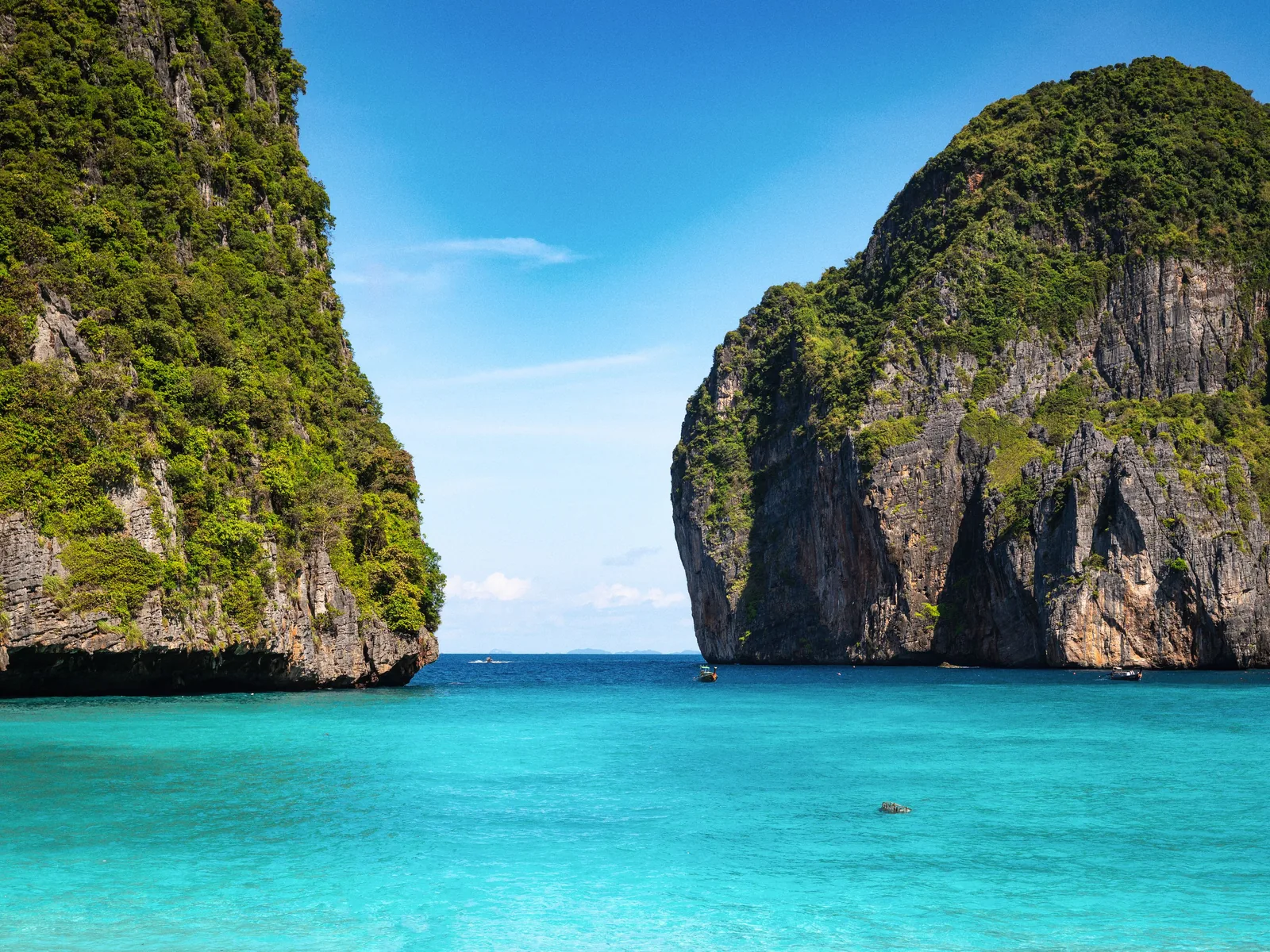 Emerald waters and limestone cliffs create a breathtaking view in Krabi, Thailand